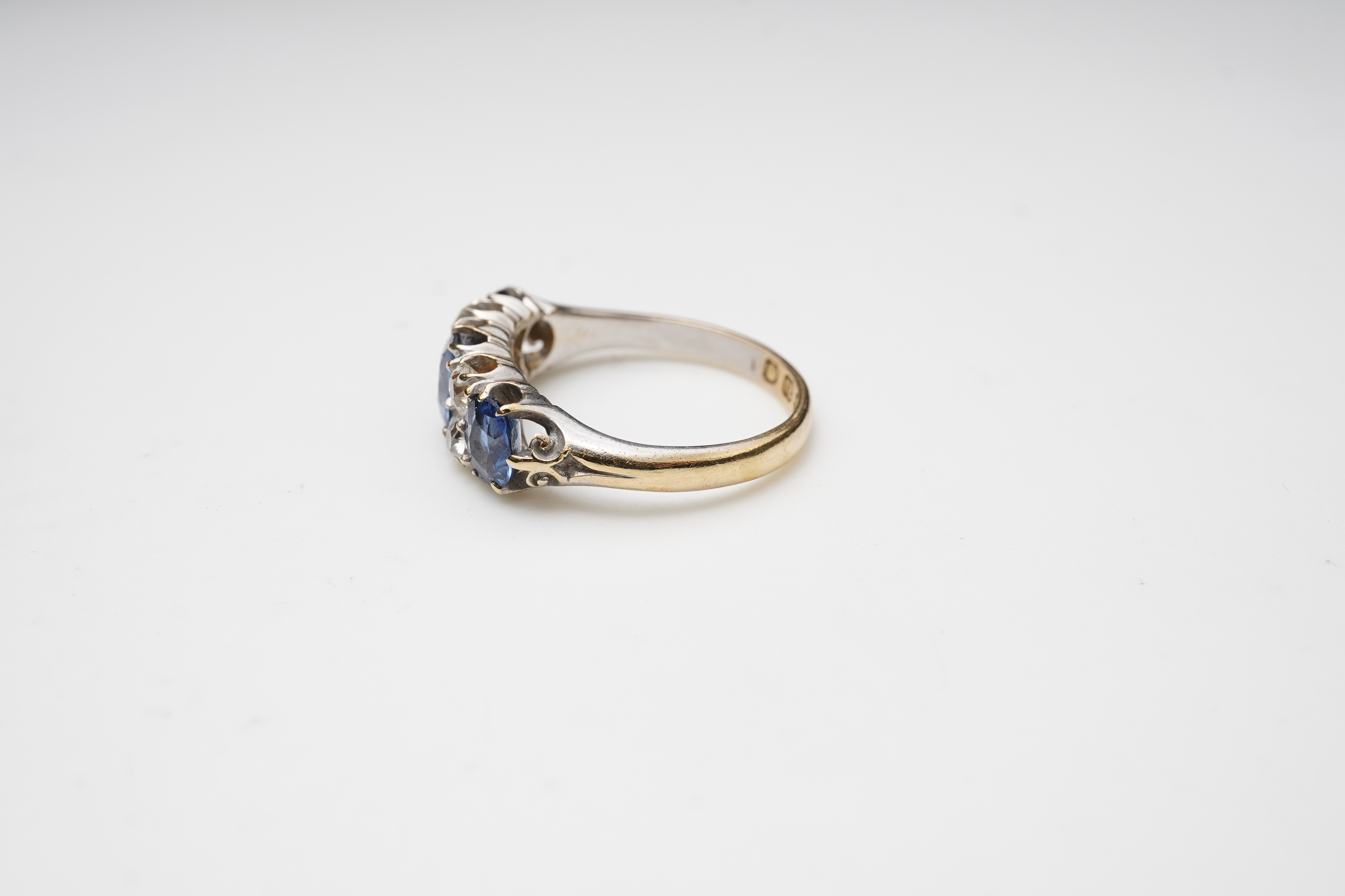 A Victorian sapphire and diamond ring, circa 1889